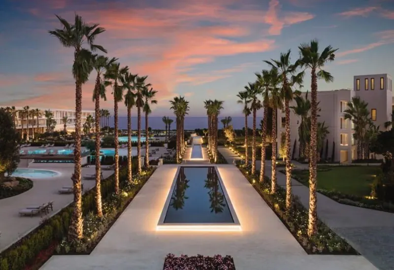 Ikos Andalusia, reflecting pool and palm trees